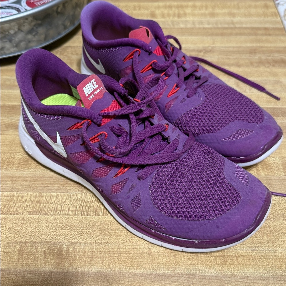 Nike Purple Running Shoes with Red Accents